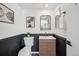 Updated bathroom with modern vanity and patterned tile at 10360 E Jewell Ave # 95, Aurora, CO 80247