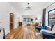 Bright living room with hardwood floors, white walls, stylish decor, and natural light at 1375 Perry St, Denver, CO 80204