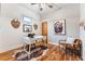 Cozy office space with hardwood floors, a white desk, and a decorative bear art piece at 1375 Perry St, Denver, CO 80204