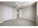 Bright bedroom featuring a closet and doorway leading to another room at 10058 Lewis St, Broomfield, CO 80021