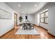 Elegant dining room showcasing hardwood floors and bright natural light at 10058 Lewis St, Broomfield, CO 80021