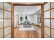 Elegant dining room showcasing hardwood floors and bright natural light at 10058 Lewis St, Broomfield, CO 80021