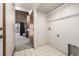 A view of the mud room and stairs up to the second floor at 10058 Lewis St, Broomfield, CO 80021