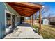 Back patio featuring a wood beam cover, ceiling fan and views of the yard at 10058 Lewis St, Broomfield, CO 80021