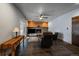 Living room featuring a fireplace, wooden flooring and comfortable seating at 13464 W Virginia Dr, Lakewood, CO 80228