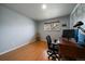 Office with hardwood floors, desk, chair, and bright natural light at 13464 W Virginia Dr, Lakewood, CO 80228