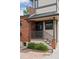 Brick patio with access to the home and a small garden area at 2771 W 38Th Ave, Denver, CO 80211