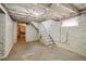 Unfinished basement with exposed brick and ample storage space at 2771 W 38Th Ave, Denver, CO 80211