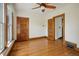 Spacious bedroom with hardwood floors and classic wooden doors at 2771 W 38Th Ave, Denver, CO 80211