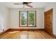 Bright bedroom with hardwood floors, large windows, and ceiling fan at 2771 W 38Th Ave, Denver, CO 80211