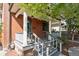 Brick home with a welcoming front porch and steps at 2771 W 38Th Ave, Denver, CO 80211