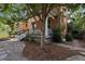 Neatly landscaped front yard with stone pathway and mature trees at 2771 W 38Th Ave, Denver, CO 80211