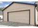 Single car detached garage with light beige door at 2771 W 38Th Ave, Denver, CO 80211