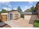 Detached garage with a shed in the backyard at 2771 W 38Th Ave, Denver, CO 80211