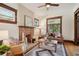 Living room with hardwood floors, fireplace and ample natural light at 2771 W 38Th Ave, Denver, CO 80211