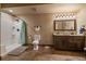 Bathroom features a shower stall, toilet, and a single sink vanity at 8090 S Homesteader Dr, Morrison, CO 80465
