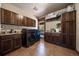 Functional laundry room features modern appliances, ample storage, and a convenient sink area for easy chores at 8090 S Homesteader Dr, Morrison, CO 80465
