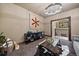 Well-lit living room showcases a modern chandelier and easy access to the staircase at 8090 S Homesteader Dr, Morrison, CO 80465