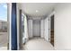 Bright bedroom with closet and entrance to stairs is freshly painted with great natural light at 3875 E 4Th Ave # 2, Denver, CO 80206