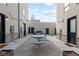 Community courtyard featuring outdoor seating and grilling area, perfect for gatherings at 3875 E 4Th Ave # 2, Denver, CO 80206