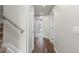 Bright hallway featuring hardwood floors and neutral wall paint at 3875 E 4Th Ave # 2, Denver, CO 80206