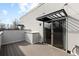 Spacious outdoor patio with modern pergola and sliding glass doors for indoor/outdoor living at 3875 E 4Th Ave # 2, Denver, CO 80206