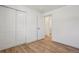 Neutral bedroom with closet and bathroom access at 6068 Lee St, Arvada, CO 80004