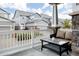 Cozy back patio area with outdoor furniture and a view of the surrounding neighborhood at 640 E Fremont Pl, Littleton, CO 80122