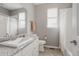 Bathroom featuring a shower-tub combination, white tiled walls, granite countertops, and a classic pedestal sink at 640 E Fremont Pl, Littleton, CO 80122