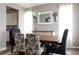Elegant dining room featuring a wooden table, stylish chairs, and decorative accents at 640 E Fremont Pl, Littleton, CO 80122