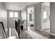 Upstairs hallway leads to bedrooms and bathroom, hardwood floors and lots of light at 640 E Fremont Pl, Littleton, CO 80122