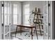 Bright home office with lots of natural light and modern decor; great for remote work and study at 640 E Fremont Pl, Littleton, CO 80122
