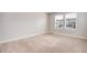 Bedroom featuring neutral carpet and paint at 16203 E 47Th Pl, Denver, CO 80239