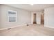 Bedroom with neutral carpet and light-colored walls at 16203 E 47Th Pl, Denver, CO 80239