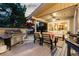 Spacious back deck with grill, dining, and lounge area, great for relaxing outdoors at 7841 Deertrail Dr, Parker, CO 80138