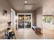 Welcoming foyer with tiled floor, bench seating, and sliding glass doors to the patio at 7841 Deertrail Dr, Parker, CO 80138