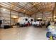 Spacious garage with a camper, truck and lots of equipment; perfect for storing vehicles and tools at 7841 Deertrail Dr, Parker, CO 80138