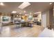 Spacious kitchen with stainless steel appliances, central island, and skylights at 7841 Deertrail Dr, Parker, CO 80138