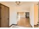 Open foyer featuring tile entry leading to hardwood floors in the spacious living areas at 57 Scott S Dr, Broomfield, CO 80020