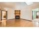 Bright living room with wood floors and a fireplace at 57 Scott S, Broomfield, CO 80020