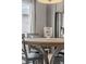 Features a round wooden table with chairs and modern decor by the window at 7380 S Shady Grove Way, Aurora, CO 80016