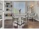 Features a round dining table with chairs and decorative lighting at 7380 S Shady Grove Way, Aurora, CO 80016