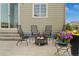 Inviting outdoor patio features a fire pit and comfortable seating for enjoying outdoor relaxation at 7380 S Shady Grove Way, Aurora, CO 80016