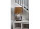 Shows staircase with a table lamp next to the stairs at 7380 S Shady Grove Way, Aurora, CO 80016