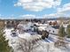 Aerial view of house, detached garage and expansive yard at 221 Mulligan Lake Dr, Mead, CO 80542