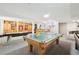 Game room featuring pool table, ping pong, and shuffleboard at 221 Mulligan Lake Dr, Mead, CO 80542