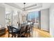 Formal dining room with a large table and chandelier at 221 Mulligan Lake Dr, Mead, CO 80542