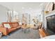 Open living room with a view of the kitchen and stairs at 221 Mulligan Lake Dr, Mead, CO 80542