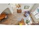 Open-concept living room featuring hardwood floors, a large window and comfortable furnishings at 2252 S Yosemite Cir, Denver, CO 80231