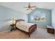 Bright main bedroom featuring vaulted ceilings and a large window with scenic views at 2252 S Yosemite Cir, Denver, CO 80231